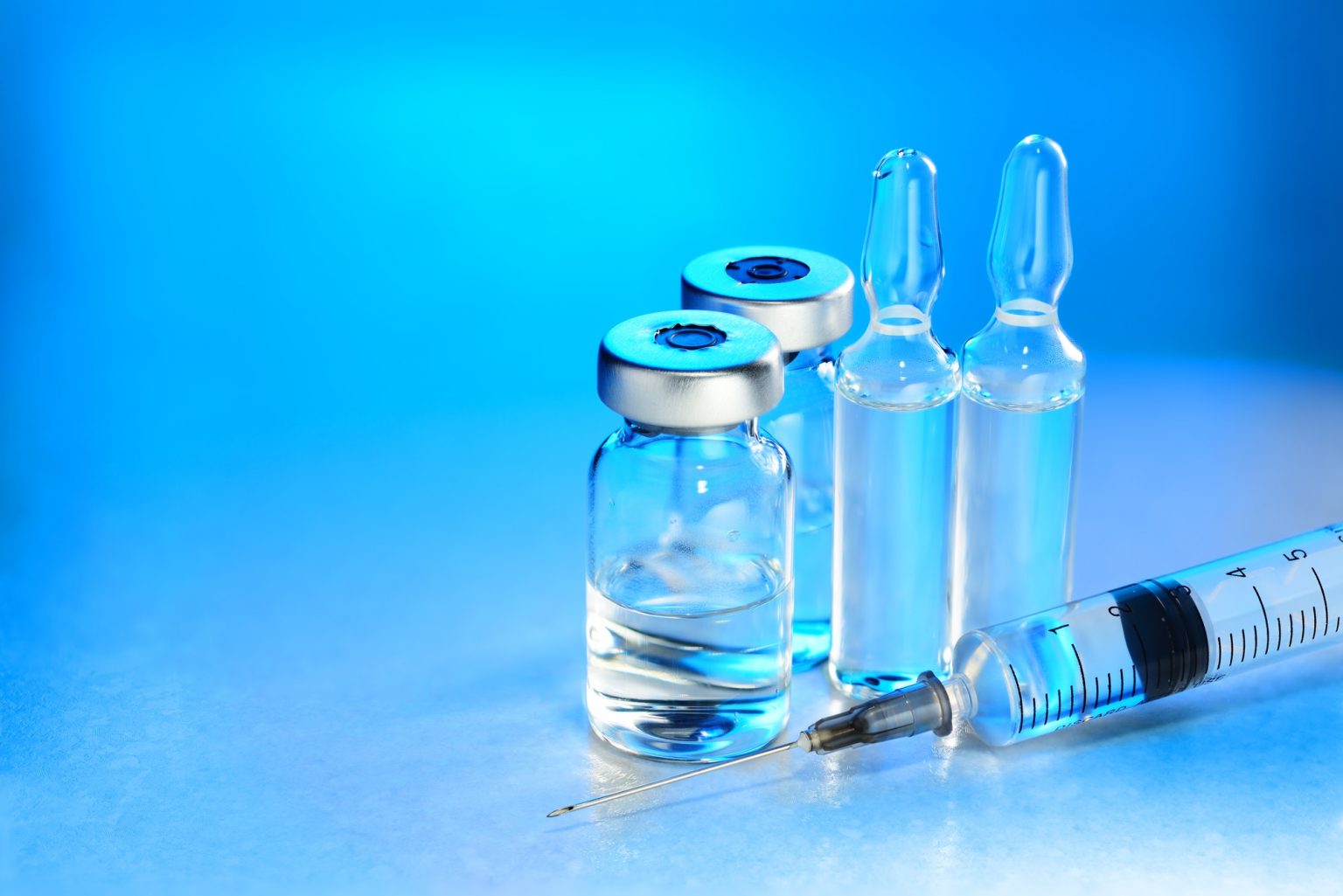 Vials ampules and syringe